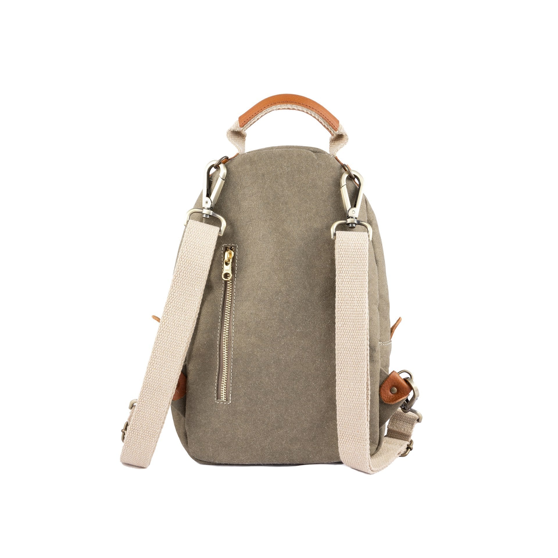 A pale khaki washable paper backpack is shown from a back angle. It features two adjustable cream canvas shoulder straps and a silver zip pocket in the rear.