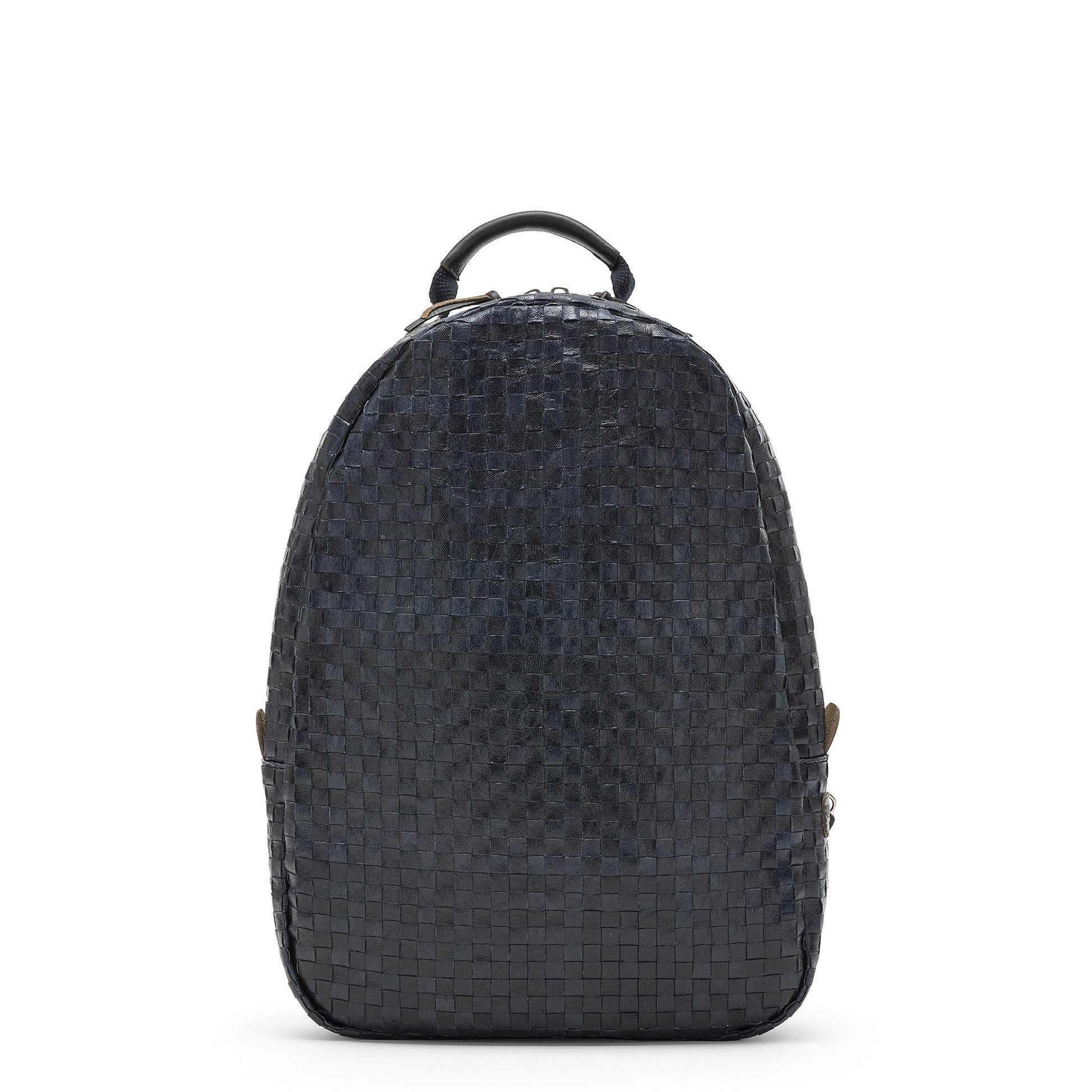 An oval washable paper woven backpack is shown from a front angle. It features a top zip and a top handle. It is navy in colour.