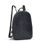 A woven washable paper backpack is shown from a 3/4 angle. It is oval in shape and features two adjustable canvas straps and a top handle. It is navy in colour.