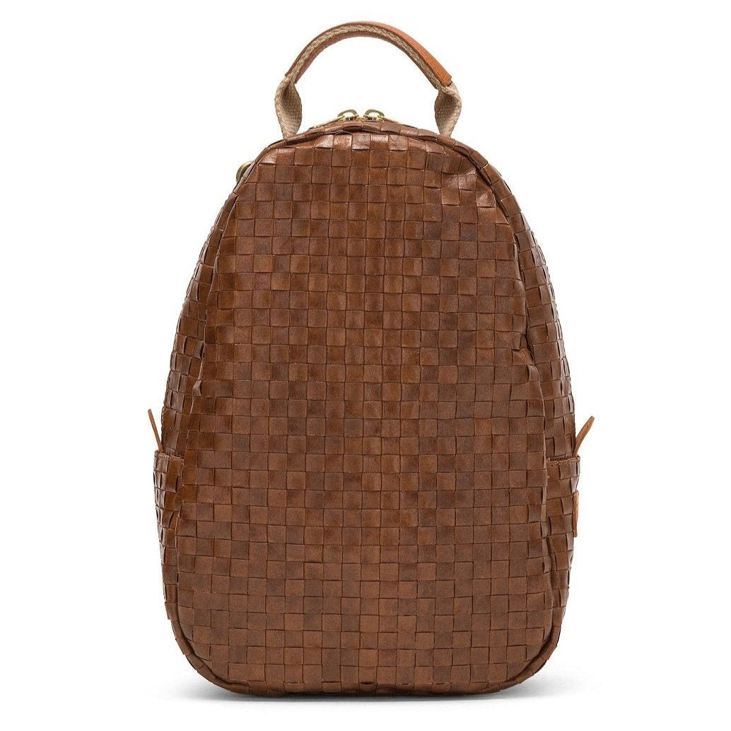 An oval washable paper woven backpack is shown from a front angle. It features a top zip and a top handle. It is brown in colour.