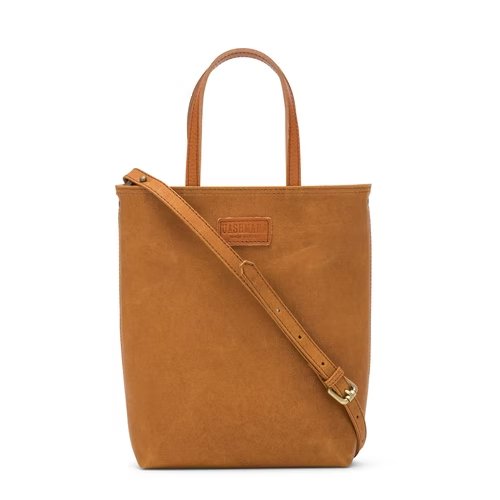 A washable paper rectangular tote with long top handles and a long shoulder strap is shown from the front angle. It is tan in colour.