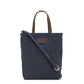 A washable paper rectangular tote with long top handles and a long shoulder strap is shown from the front angle. It is navy in colour.