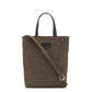 A washable paper rectangular tote with long top handles and a long shoulder strap is shown from the front angle. It is faded chocolate brown in colour.