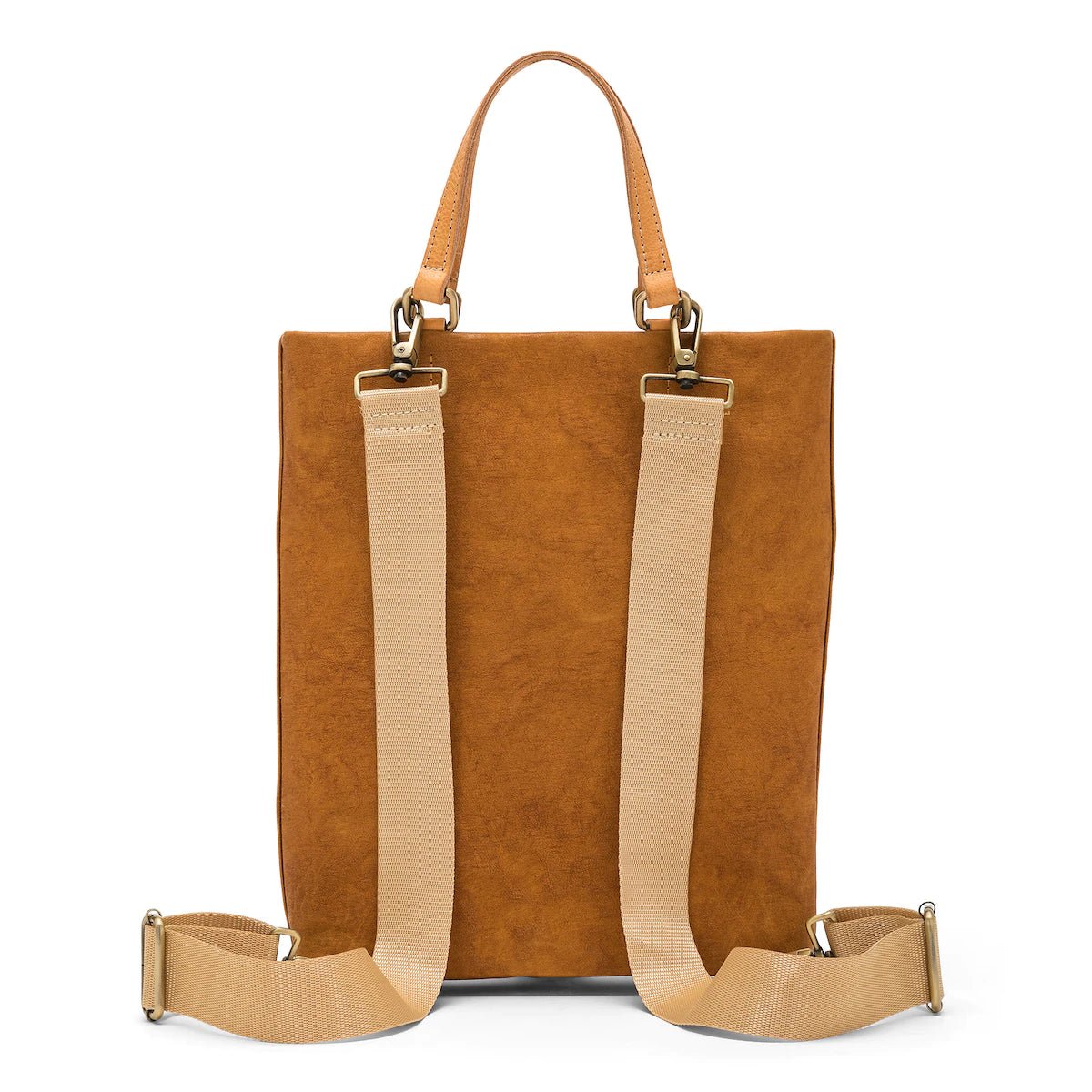 A rectangular tote bag backpack is shown from the back angle. It features two top tote handles, and two adjustable canvas shoulder straps. It is bright tan in colour.