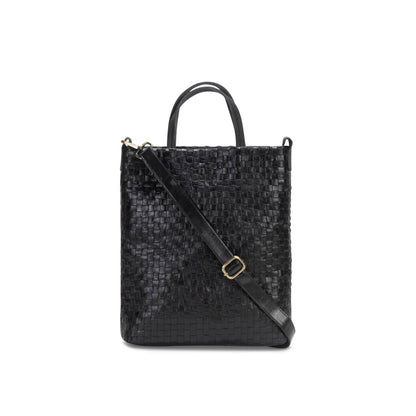 A woven washable paper tote bag is shown from the front angle. It features two top handles and a long adjustable shoulder strap. It is black in colour.