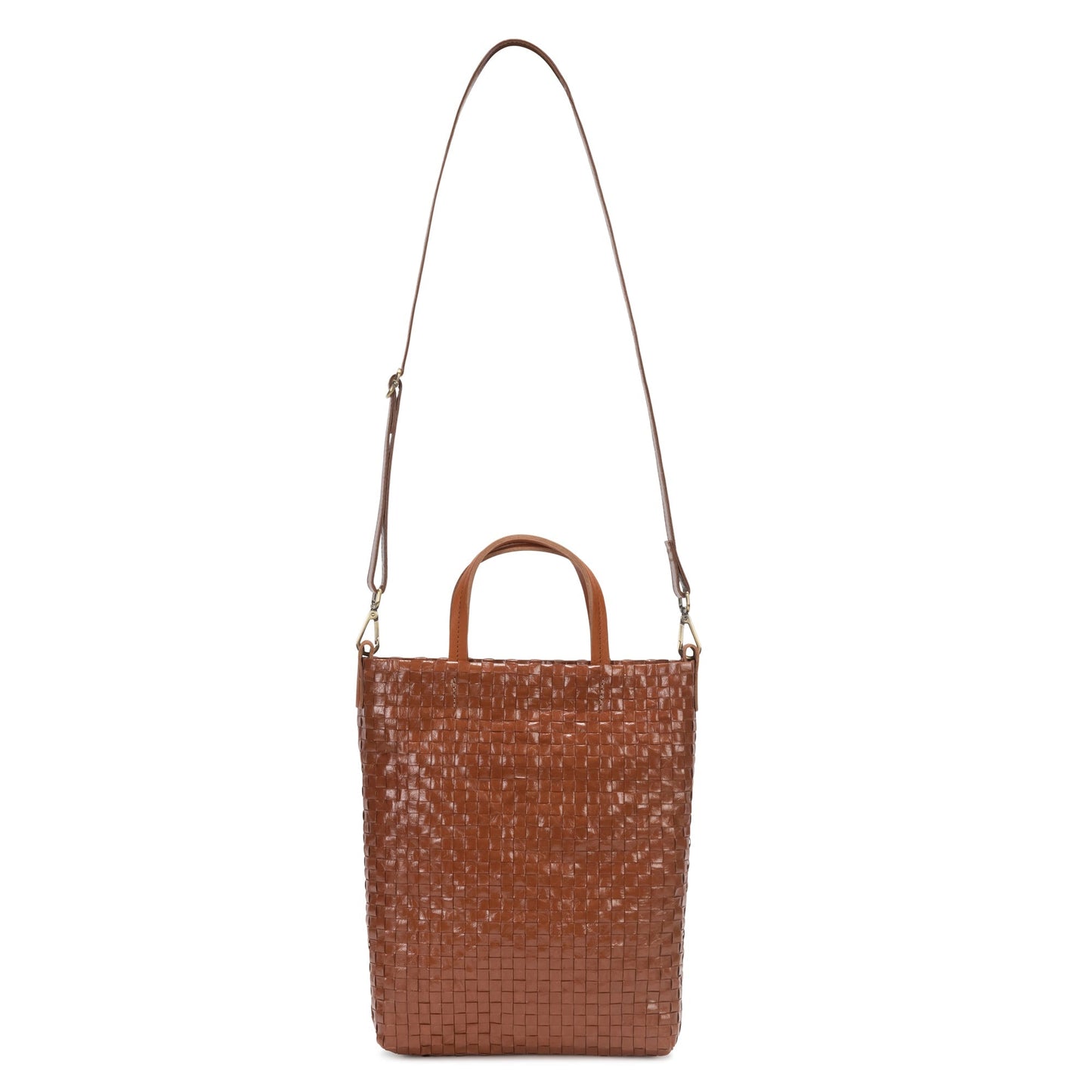 A washable paper tote bag is shown with a long shoulder strap and two top handles. The fabric is woven and it is brown in colour.