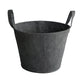 A washable paper basket is shown from the side angle. It has two top handles and is shown in a dark grey colour.