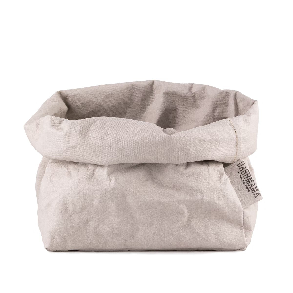 A washable paper bag is shown. The bag is rolled down at the top and features a UASHMAMA logo label on the bottom left corner. The bag pictured is the large size in pale grey.