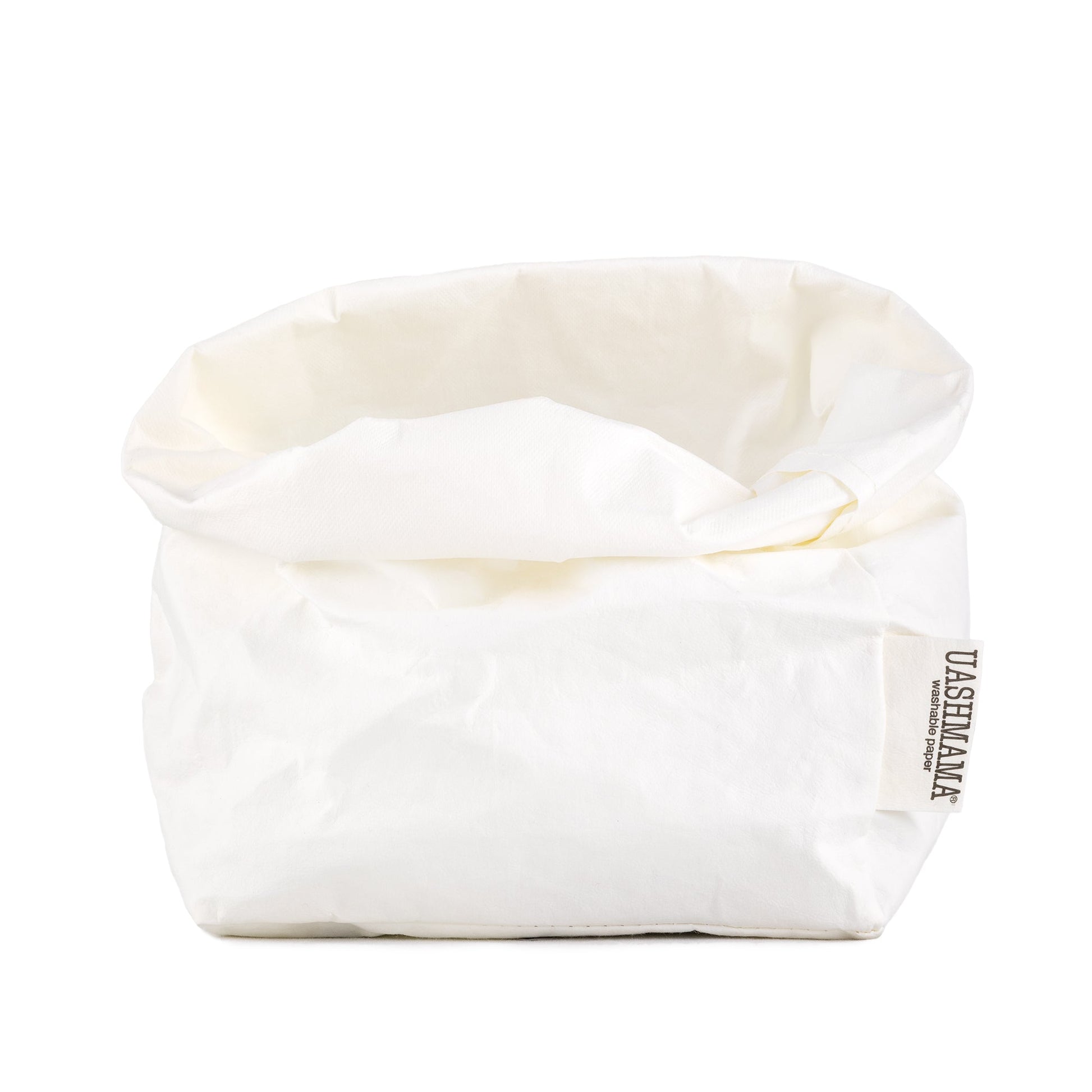A washable paper bag is shown. The bag is rolled down at the top and features a UASHMAMA logo label on the bottom left corner. The bag pictured is the medium size in white.