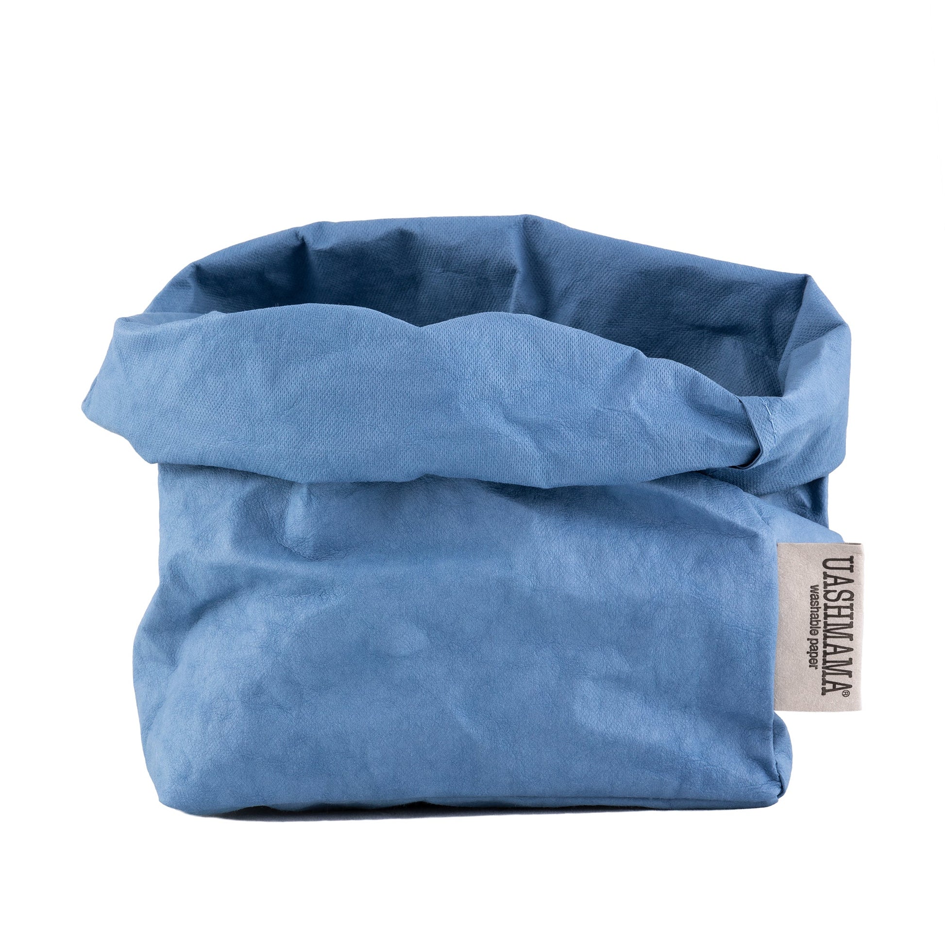 A washable paper bag is shown. The bag is rolled down at the top and features a UASHMAMA logo label on the bottom left corner. The bag pictured is the medium size in blue.