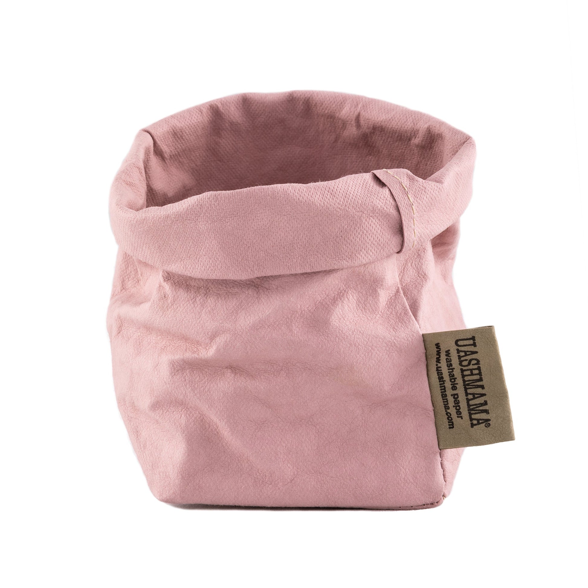 A washable paper bag is shown. The bag is rolled down at the top and features a UASHMAMA logo label on the bottom left corner. The bag pictured is the piccolo size in pale pink.