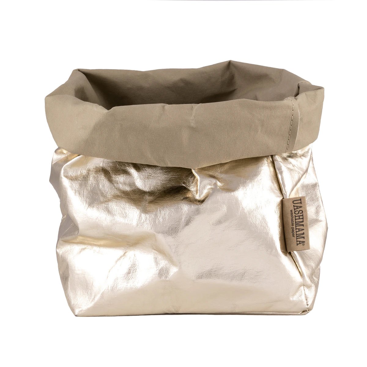 A washable paper bag is shown. The bag is rolled down at the top and features a UASHMAMA logo label on the bottom left corner. The bag pictured is the large plus size in metallic platinum.