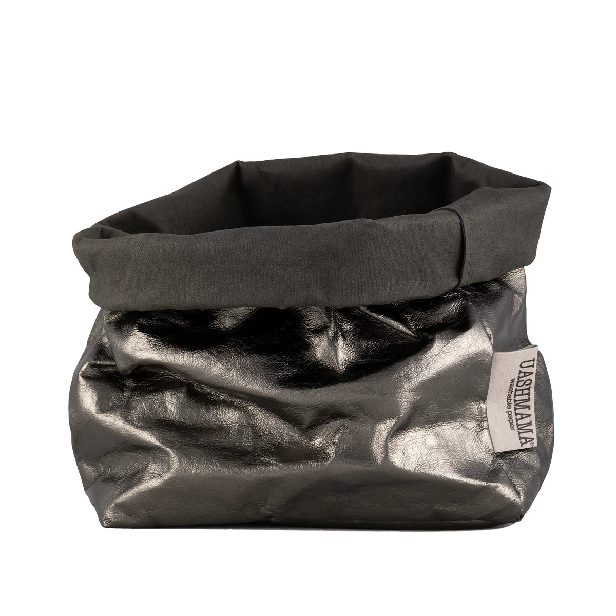 A washable paper bag is shown. The bag is rolled down at the top and features a UASHMAMA logo label on the bottom left corner. The bag pictured is the medium size in metallic dark grey.
