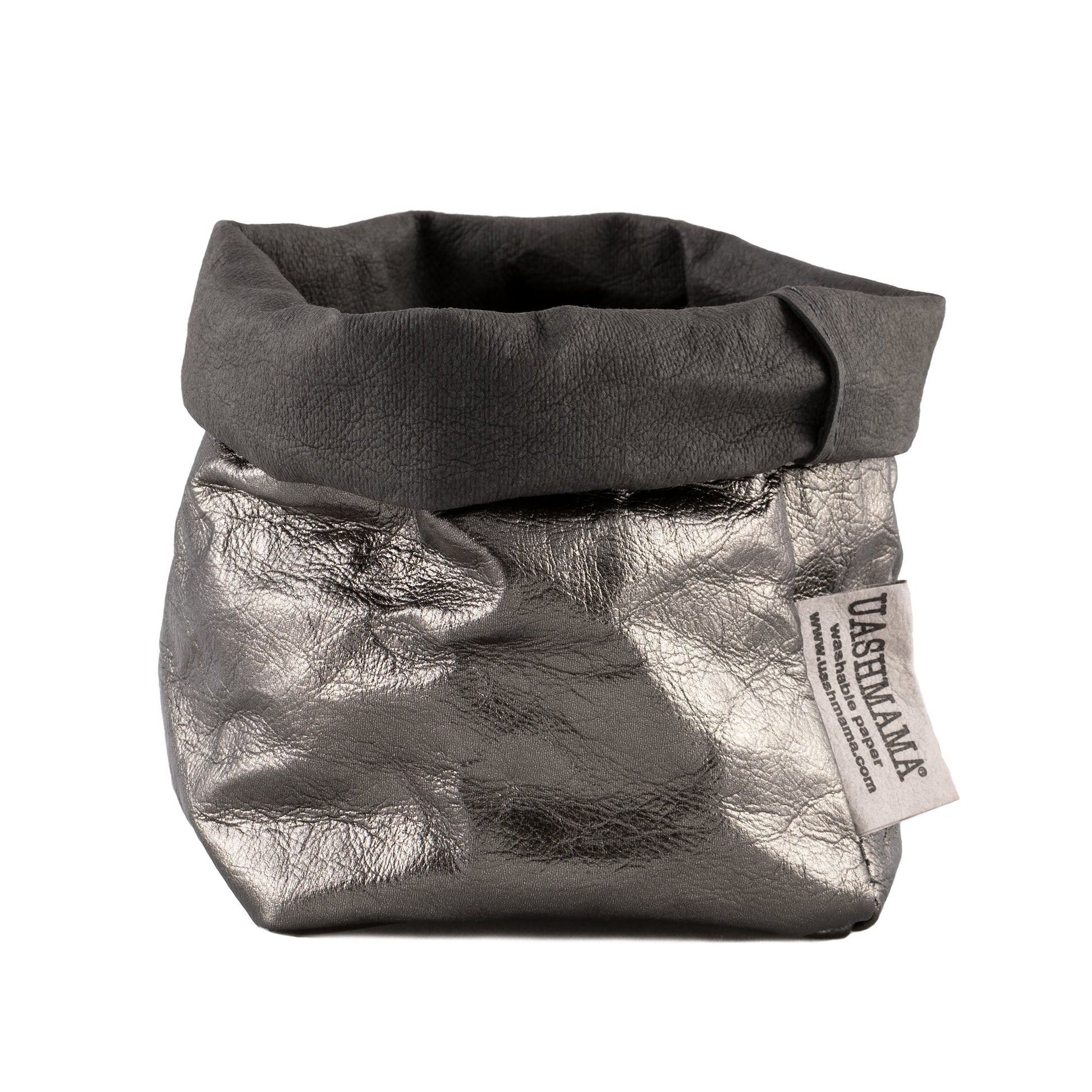 A washable paper bag is shown. The bag is rolled down at the top and features a UASHMAMA logo label on the bottom left corner. The bag pictured is the piccolo size in metallic dark grey.