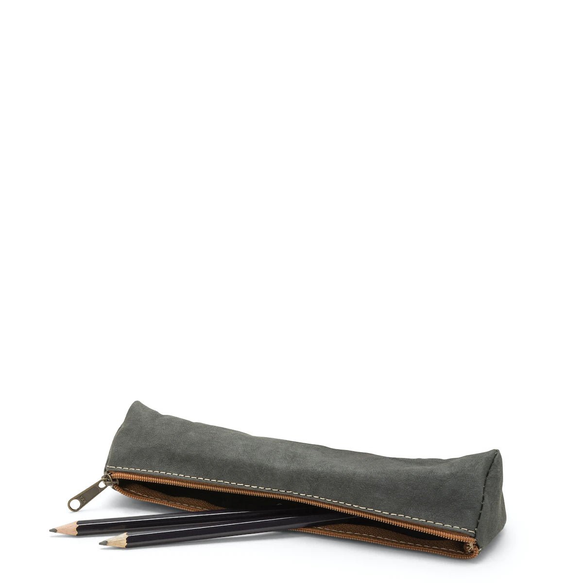 A washable paper pencil case is shown on its side with two pencils spilling out. The pencil case is dark grey in colour and has a metal zip closure.