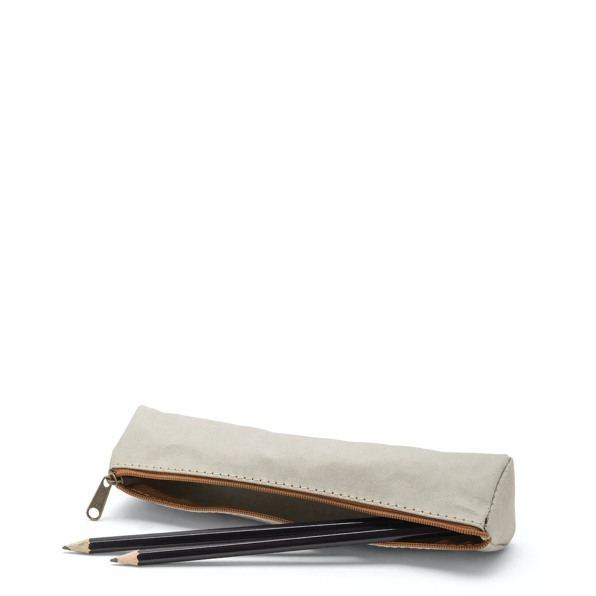 A washable paper pencil case is shown on its side with two pencils spilling out. The pencil case is pale grey in colour and has a metal zip closure.