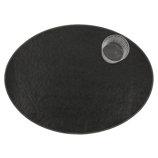 An oval washable paper placemats is shown with a small drinking glass in the upper right hand corner. The placemat shown is black.