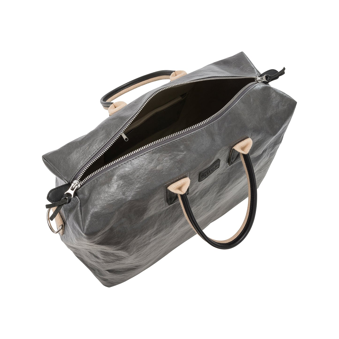 An extra large washable paper holdall is shown from above with the zip open. This shows an internal zipped pocket and organic cotton lining. The bag has two recycled cotton carry handles and a recycled cotton shoulder strap. The bag shown is dark grey.