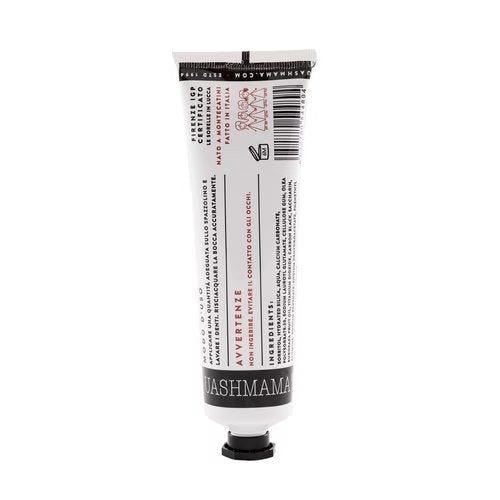 A white tube of toothpaste is shown standing upright on it's black screw-on lid. The UASHMAMA logo is shown around the neck of the tube and the ingredients of the toothpaste are shown in small lettering on the body of the tube.