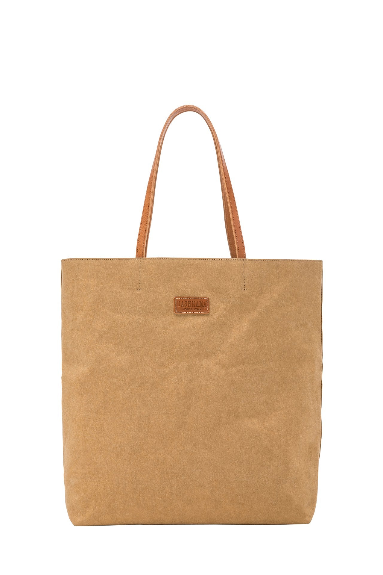 A washable paper tote back is shown. It has two long leather handles and small leather UASHMAMA label on the front. It is shown in a tan colour.