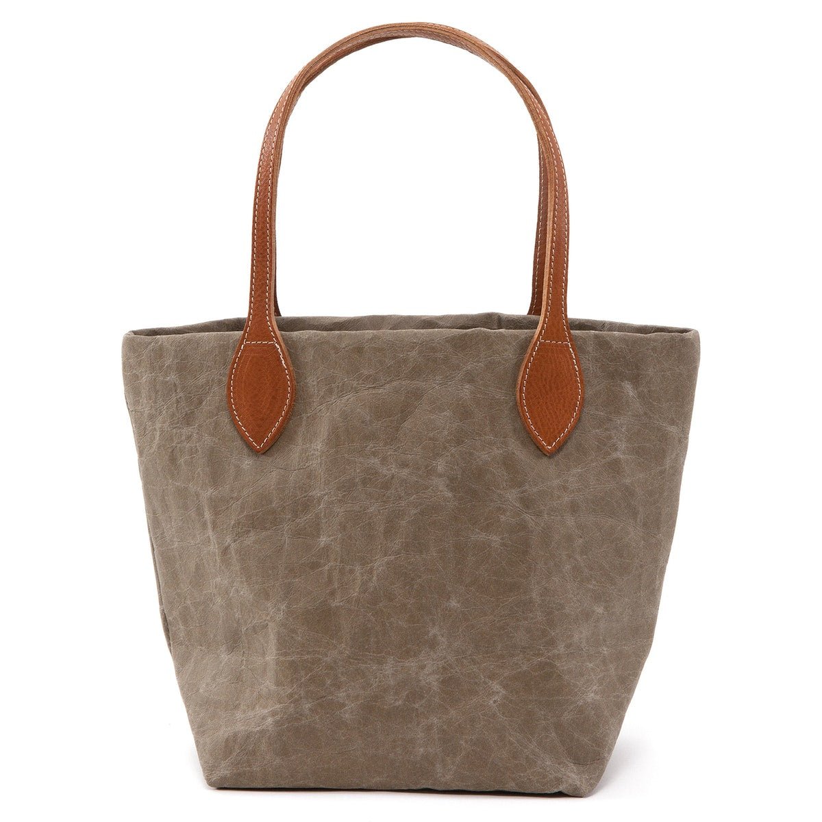 A small washable paper tote is shown. It has two long tan leather handles. The bag shown is in an olive colour.
