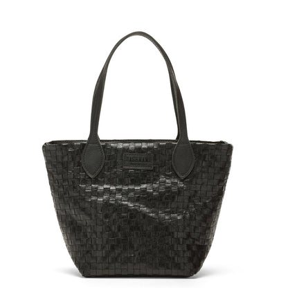 A small washable paper woven tote is shown. It has two long black leather handles and a black leather UASHMAMA logo label on the outside in between the handles. The bag shown is black.