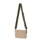 A rectangular washable paper handbag with an external side pocket is shown. The bag has a canvas strap, washable paper details and metal fastening clips to attach the straps to the bag. The bag closes by a zip. The bag shown is sand coloured with an olive strap.