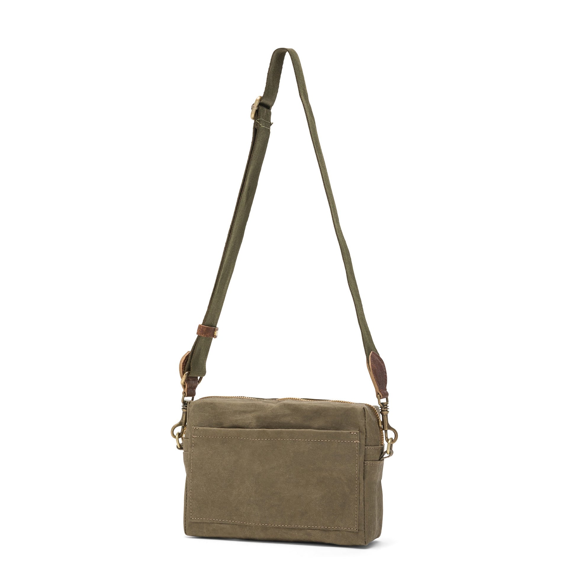 A rectangular washable paper handbag with an external side pocket is shown. The bag has a canvas strap, washable paper details and metal fastening clips to attach the straps to the bag. The bag closes by a zip. The bag shown is olive with an olive strap.