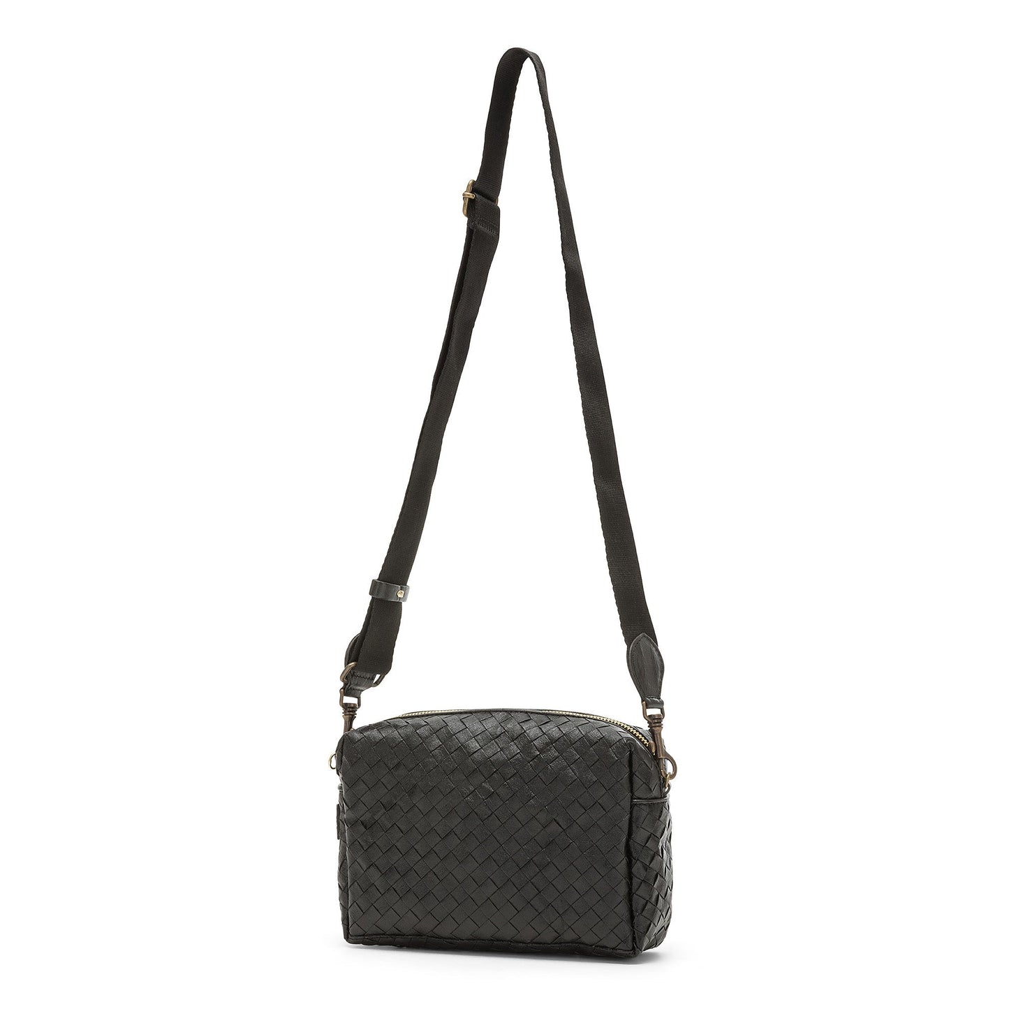 A small woven washable paper handbag is shown. The bag has a wide fabric shoulder strap. The bag and the strap are black.