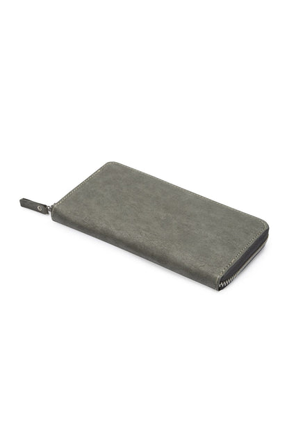 The outside of a large zippered washable paper wallet is shown. The image also shows a silver zip and washable paper zip pull. The wallet shown is dark grey.