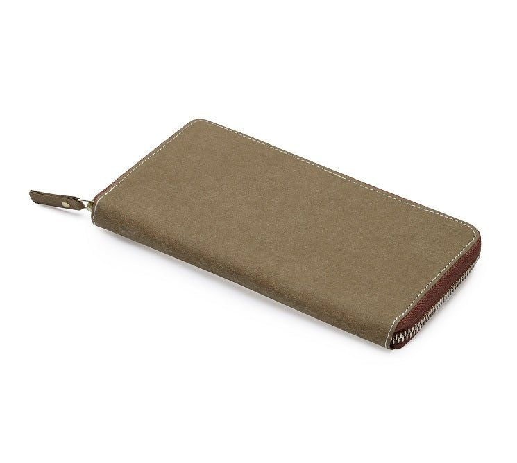 The outside of a large zippered washable paper wallet is shown. The image also shows a silver zip and washable paper zip pull. The wallet shown is an olive colour.