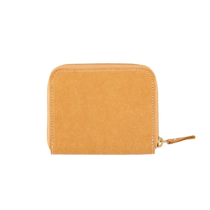 The outside of a small zippered washable paper wallet is shown. The image also shows a silver zip and washable paper zip pull. The wallet shown is light camel in colour.